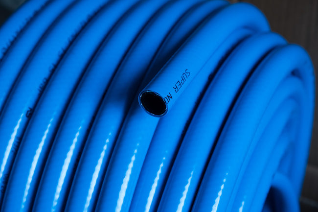 Garden hose wound onto a hose management reel